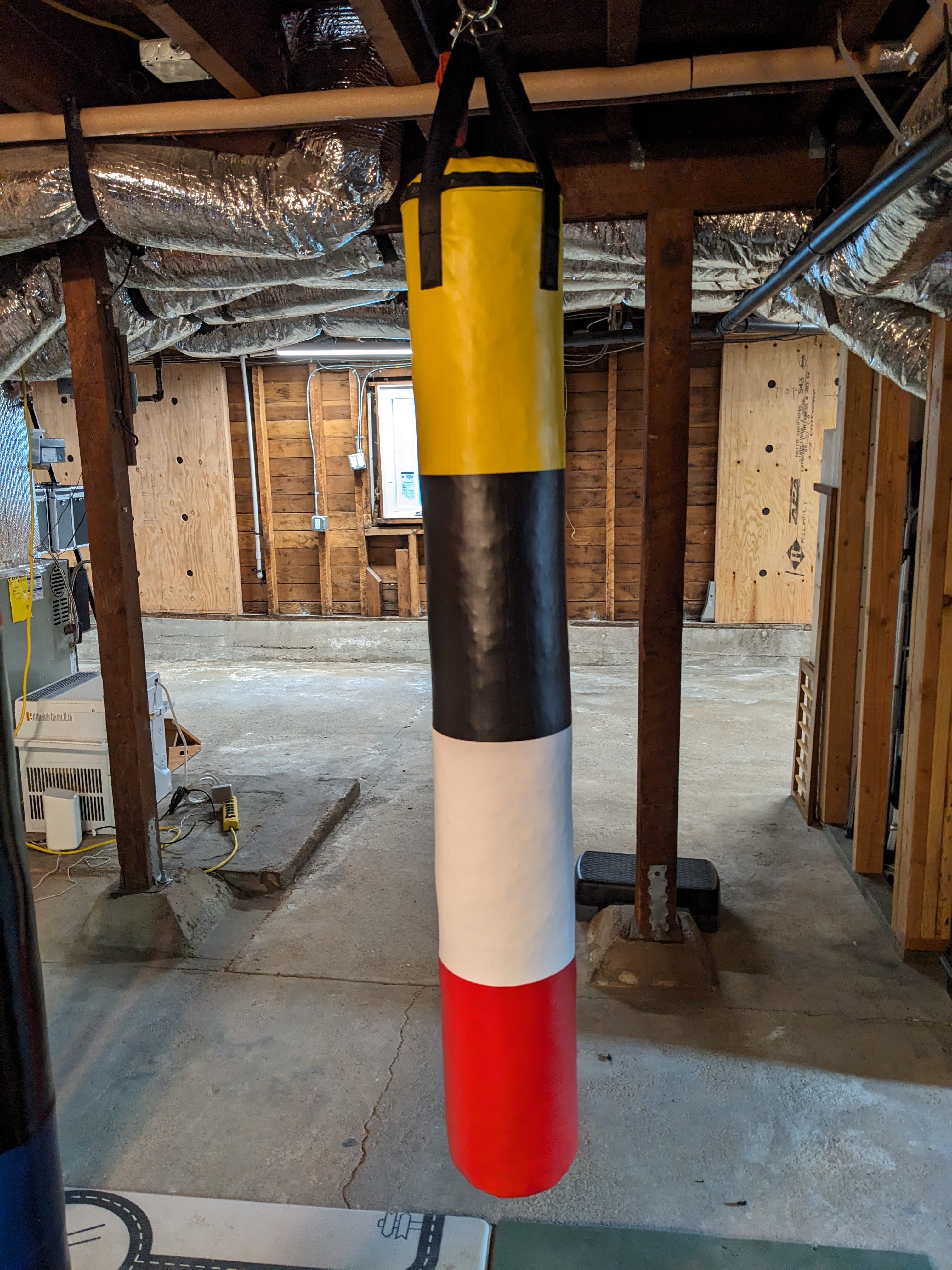Compact MMA Heavy Bag Set Up in Basement